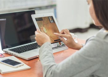 Woman Using Ipad | EMS